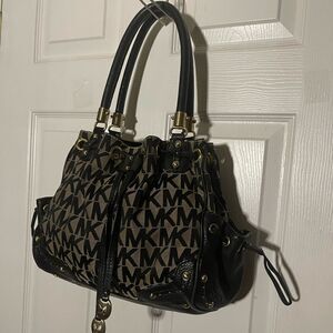 Michael Kors Black and Cream fabric logo Leather trims & strap shoulder Bag.